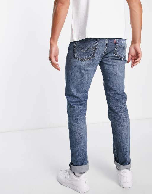 Levi s 511 Schmal geschnittene Jeans in verwaschenem Blau mit Abnutzungen ASOS