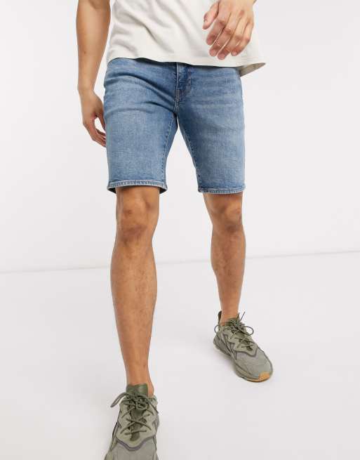 Levi s 511 slim fit hemmed denim shorts in baguette mid wash ASOS