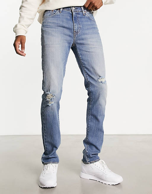 Levi's 511 slim fit jeans in light blue vintage wash with destruction | ASOS
