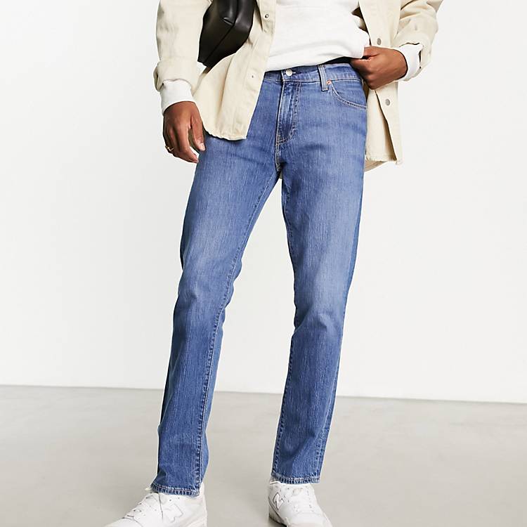 Levi's 511 slim fit jeans in mid wash blue | ASOS