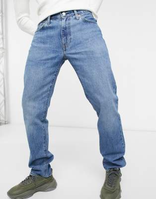 Levi's - 511 - Slim-fit jeans in middenblauw met wassing | ASOS