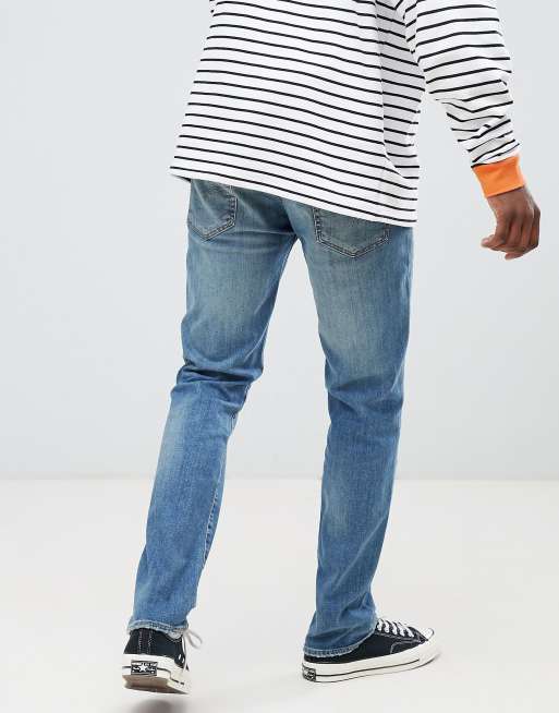 Levi's 511 - Slim-fit jeans met lage taille en zonvervaagde blauwe wassing, 2 van 4