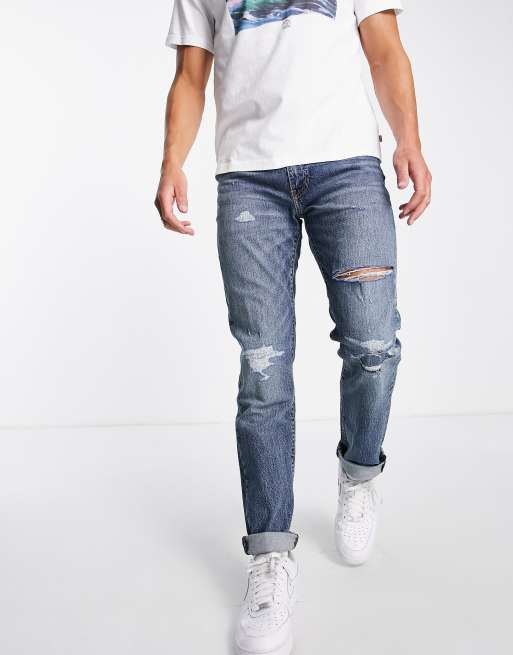 Levi's - 511 - Smalle jeans med sliddetaljer i blå