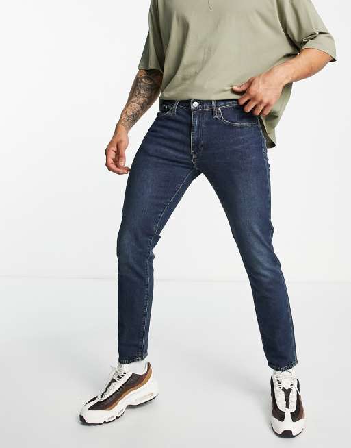 Levi's – 512 – Ciemnoniebieskie dopasowane jeansy ze zwężanymi nogawkami