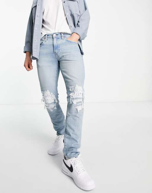 Levi's – 512 – Dopasowane jeansy ze zwężanymi nogawkami z przetarciami
