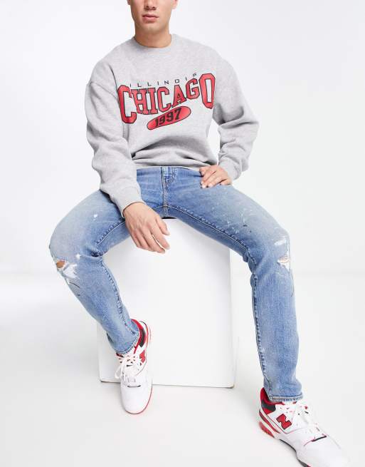 Levi's - 512 - Jean slim coupe fuselée avec détails déchirés - Bleu moyen