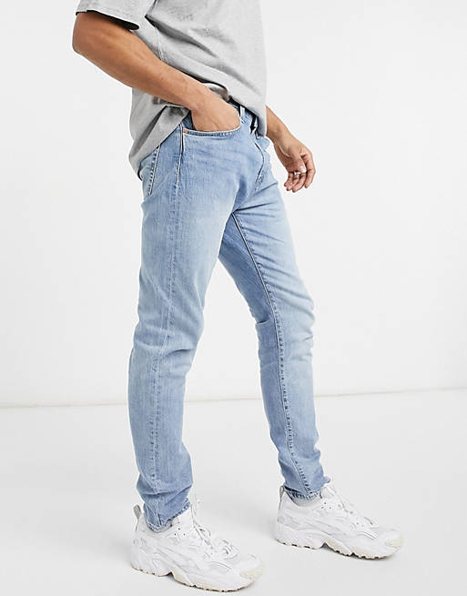 Jeans slim affusolati lavaggio chiaro Asos Uomo Abbigliamento Pantaloni e jeans Jeans Jeans affosulati 512 