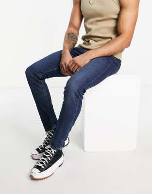 Levi's 512 slim taper lo ball jeans in navy - ASOS Price Checker