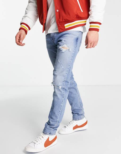 Levi's – 512 Lo-Ball – Schmal zulaufende Jeans in verwaschenem Hellblau mit schmalem Schnitt und Rissen