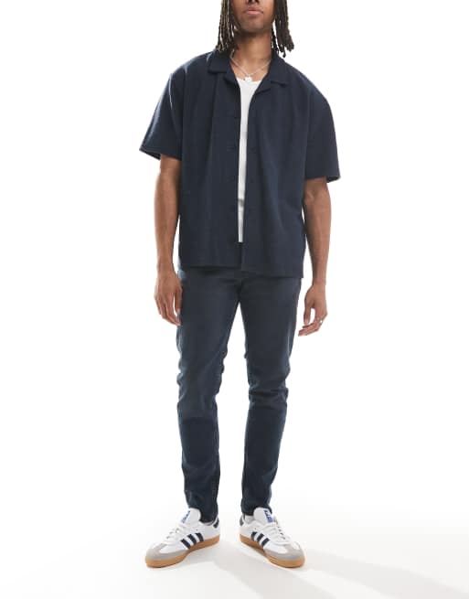 Levi's 512 – Mörkblåtvättade, avsmalnande jeans med smal passform