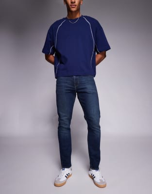 Levi's 512 slim taper jeans in dark wash-Navy