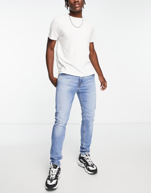 Levi's 512 slim taper jeans in light blue wash | ASOS