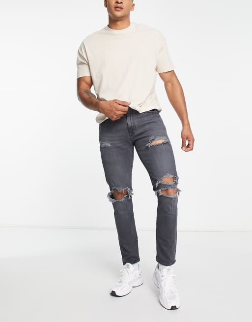 Levi s 512 slim taper jeans with distressing in black wash