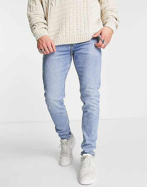 Levi's 512 slim taper lo ball jeans in light blue wash | ASOS