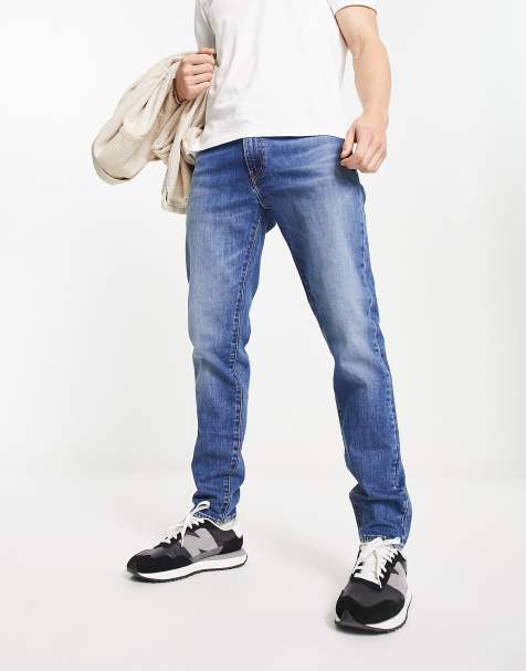 Levi's 512 slim tapered fit jeans in mid blue wash - view 1