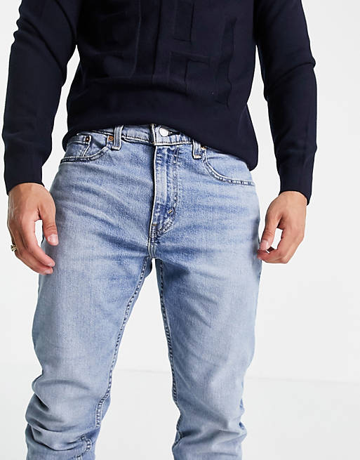Levi's 512 slim tapered fit lo-ball jeans in mid wash blue | ASOS