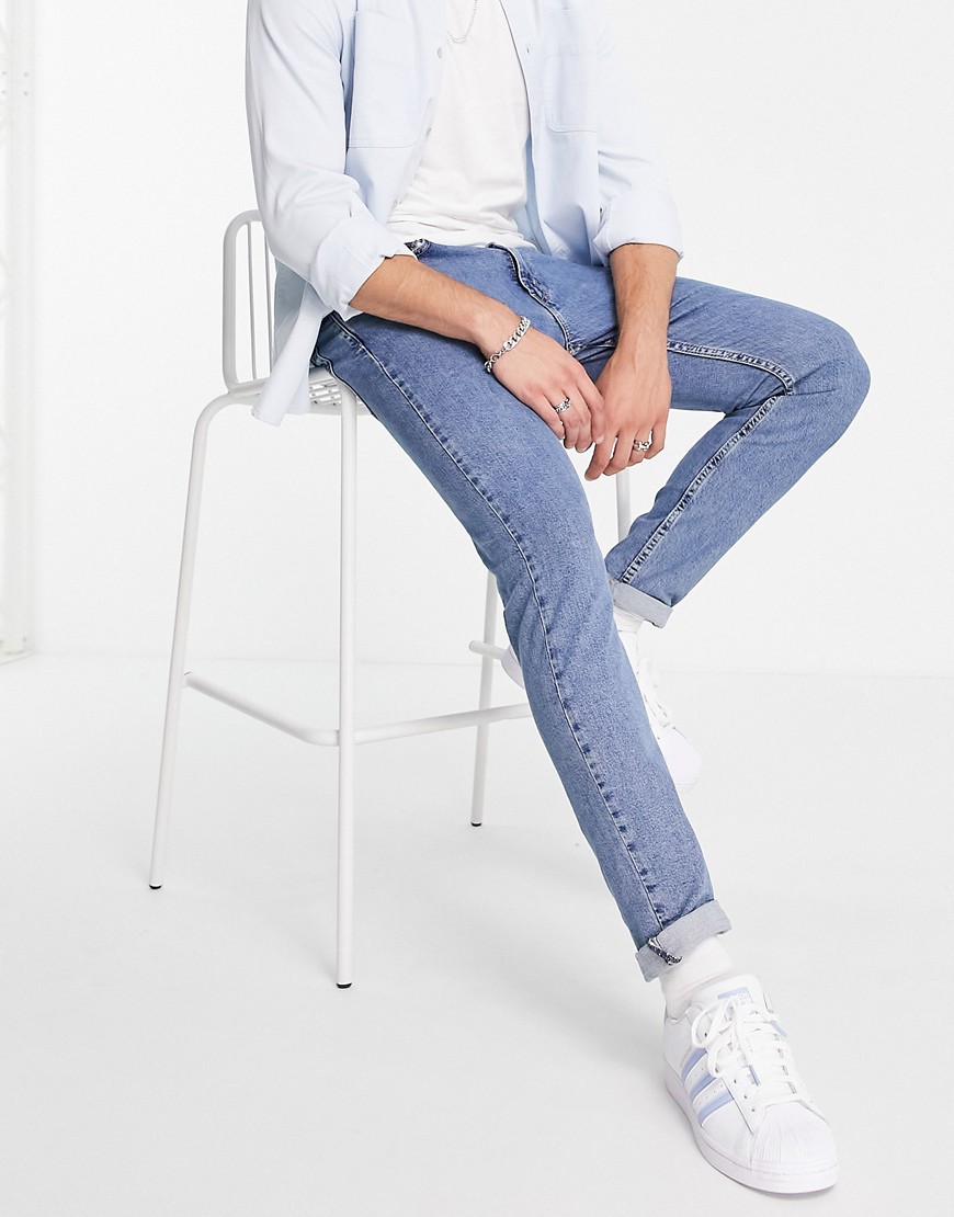 Levi's 512 slim tapered fit lo-ball jeans in mid wash blue - Asos UK |  StyleSearch