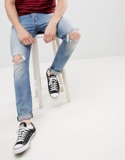 Levi's 512 slim tapered low rise knee rip jeans in monsoon light wash | ASOS