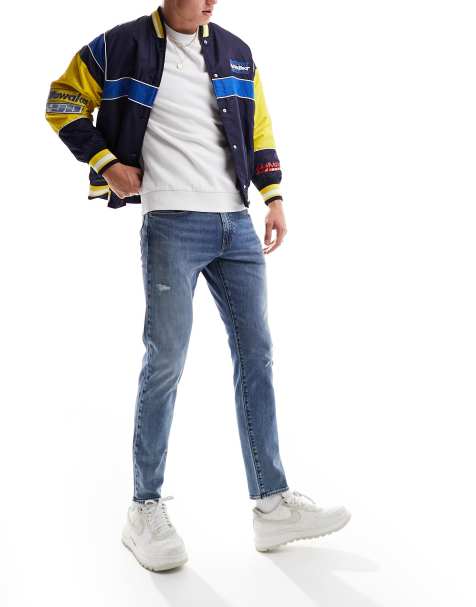 Levi's - 512 - Smalle, toelopende jeans in mid-wash blauw - view 1