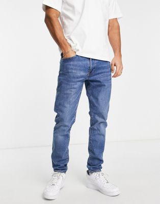 Levi's 512 tapered jeans in mid blue