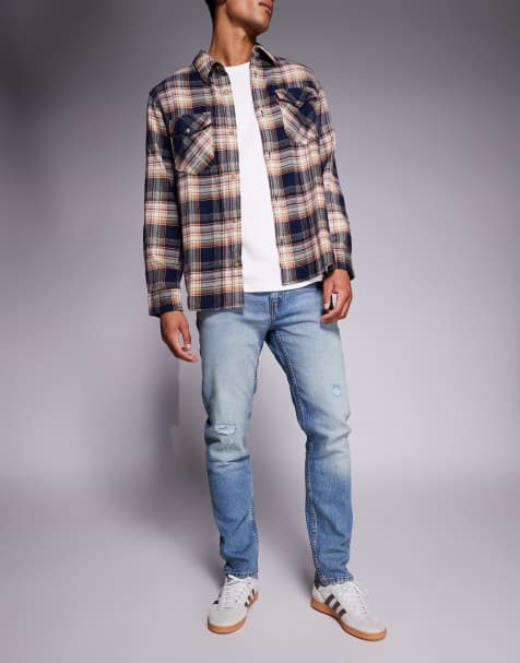 Levi's - 515 - Mellemvaskede smalle jeans med sliddetaljer - view 1