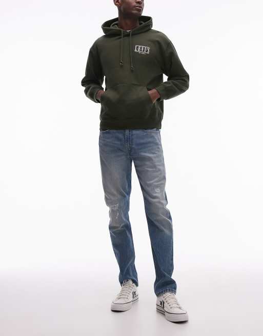 Levi's – 515 – Niebieskie zwężane jeansy o dopasowanym kroju z przetarciami
