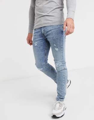 levi's 519 skinny distressed jeans