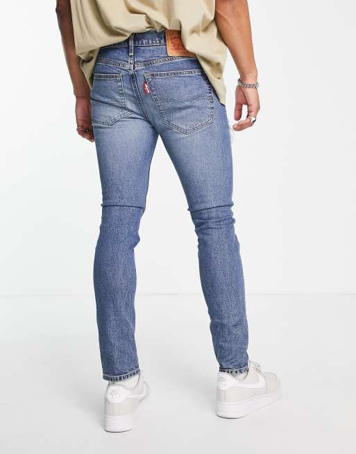 Levi's – 519 – Jeans in verwaschenem Mittelblau mit sehr engem Schnitt und Abnutzungen, 2 von 4
