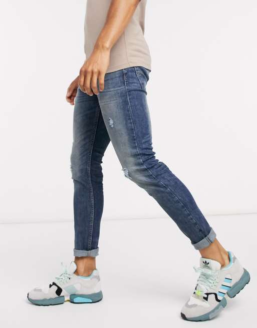 Levi's 519 super skinny fit hi-ball jeans in tide ride distressed advanced  vintage wash | ASOS