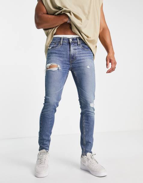 Levi's - 519 - Super skinny jeans in midblauwe wassing met distressing - view 1