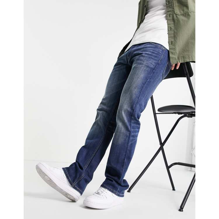 Levi s 527 slim bootcut jeans in mid blue