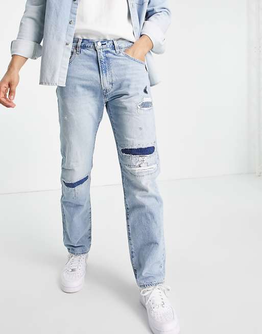 Levi's 551z authentic straight fit jeans in ghost face distressed repair light indigo wash | ASOS