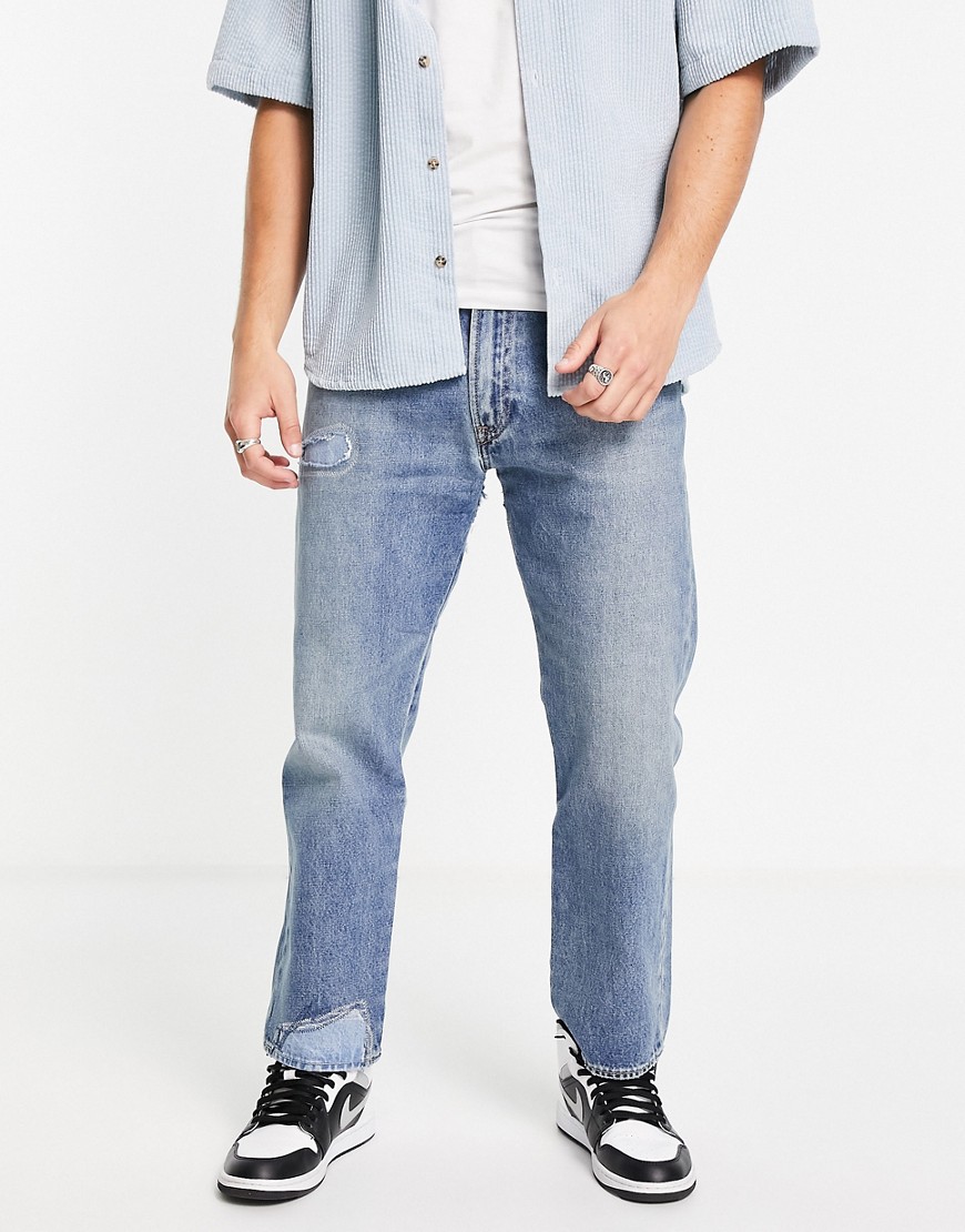 levi's - 551z - cropped jeans med lige pasform i mellemblå
