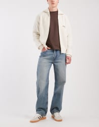 Levi's 565 loose straight denim jeans in vintage yellow tint wash