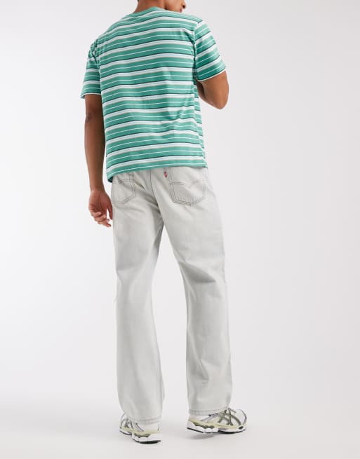Levi's 565 loose straight jeans with rips in bleach wash | ASOS