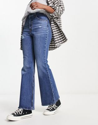 Levi's 70's high rise distressed flares in mid wash - ASOS Price Checker
