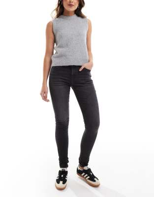 Levi's 710 - Jeans mit superengem Schnitt in verwaschenem Schwarz