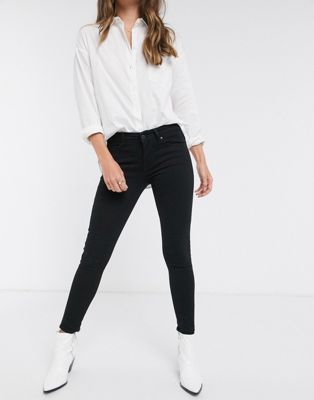 Levi's 711 Women’s Mid Rise Skinny Ripped Jeans In Black 