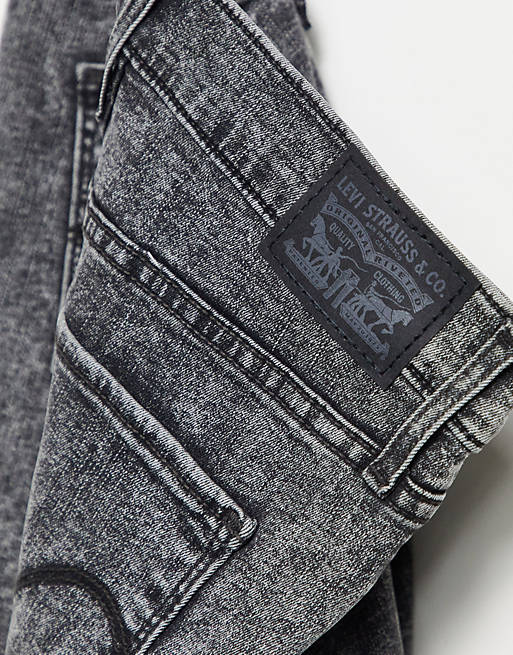 Levi's 720 high rise super skinny jeans in black acid wash | ASOS