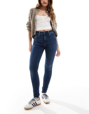 Enge Jeans mit hohem Bund in mittlerer Waschung-Blau Blau W28 L30