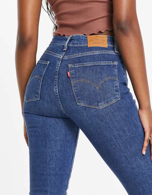 Levi's 721 high-rise skinny jeans in dark wash blue | ASOS