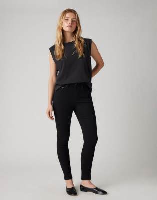 Jeans mit engem Schnitt und hohem Bund in Schwarz Schwarz W30 L30