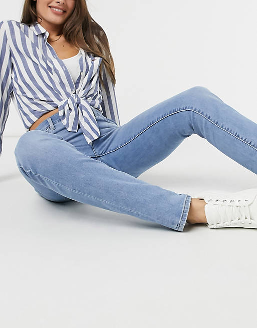 Levi's 724 high rise straight leg jeans in mid wash blue | ASOS