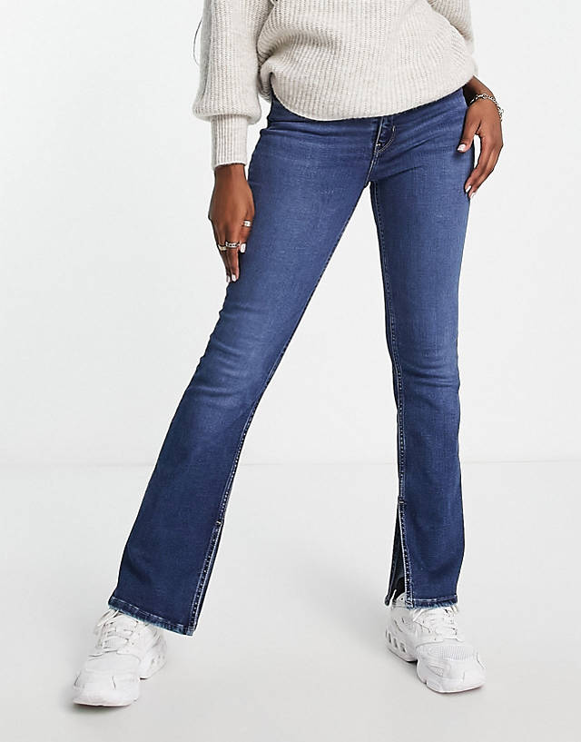 Levi's - 725 high rise slit bootcut jean in mid wash blue