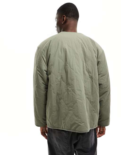 Levi's - Abbots - Omkeerbaar gewatteerd jack in blauw groen/crème met voering van imitatieschapenvacht , 4 van 4