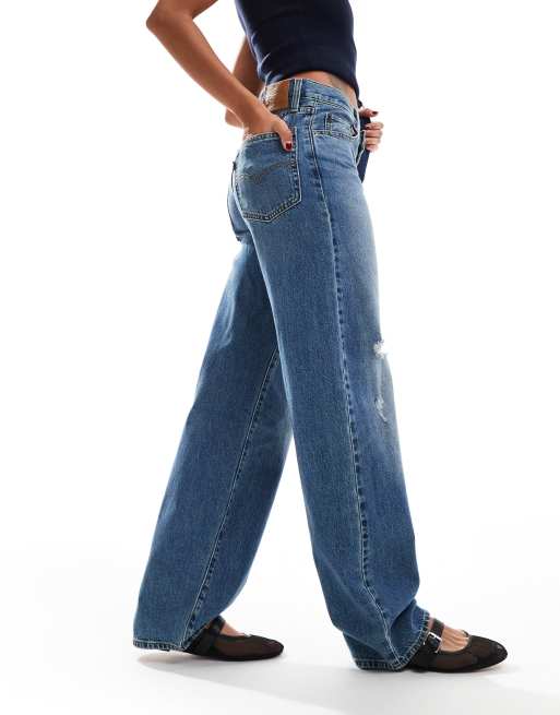 Baggy distressed jeans deals