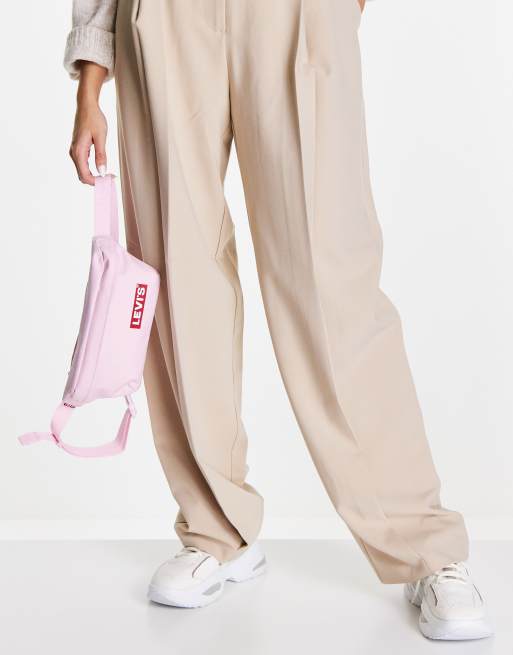 Levi's banana sling bag in light pink