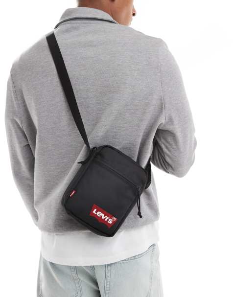 Levi's batwing logo mini crossbody bag in black - view 1