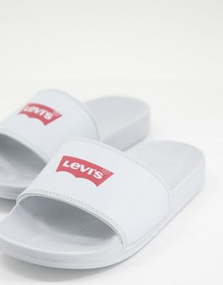 Levi's batwing logo slider in blue - ASOS Price Checker