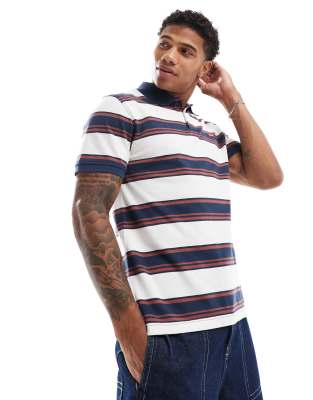 batwing logo stripe pique polo in blue